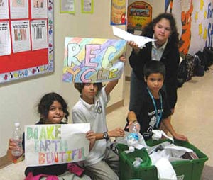 Students inspired by the book Something Beautiful start a recycling program